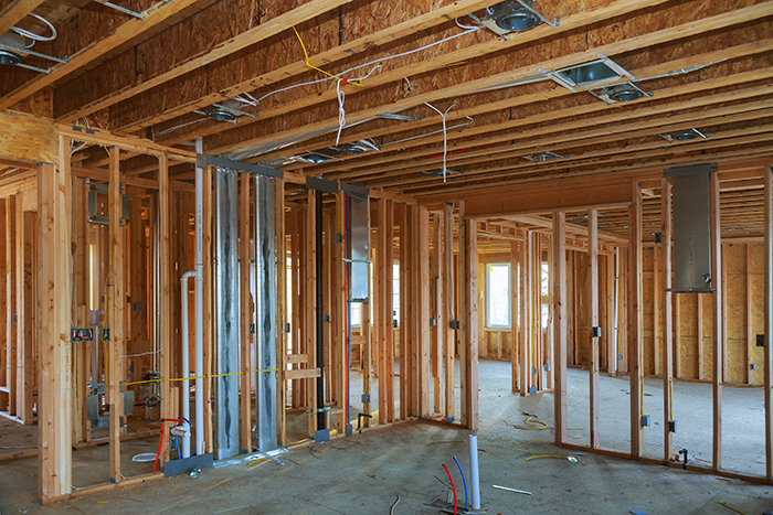 Interior framing beam of new house under construction home framing beam construction